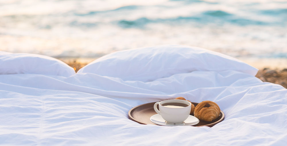 Best summer duvets to help you sleep better this summer banner.