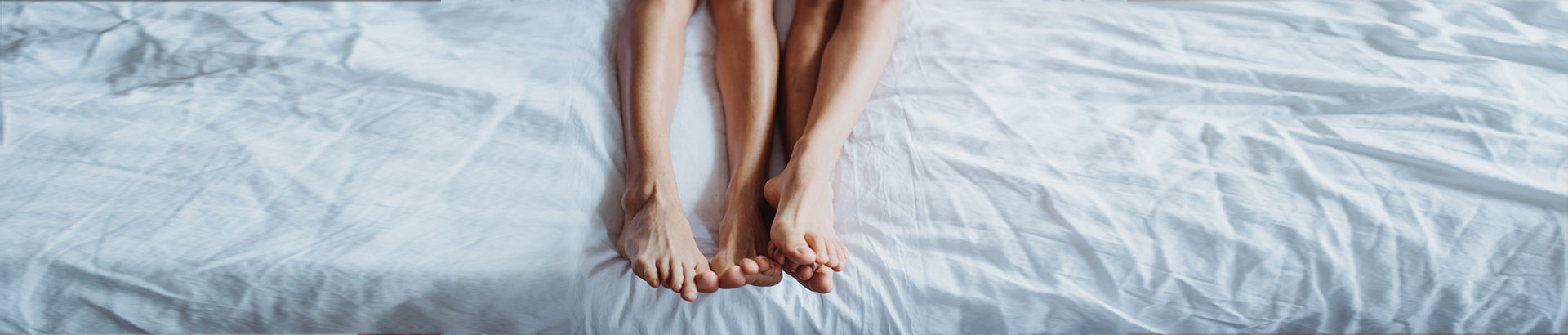 Couple reducing the risk of sleep apnea through bed sharing
